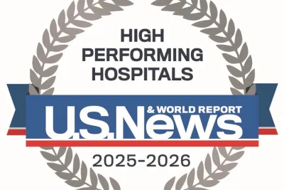 Emblem that represents high performing in several categories by US News & World Report