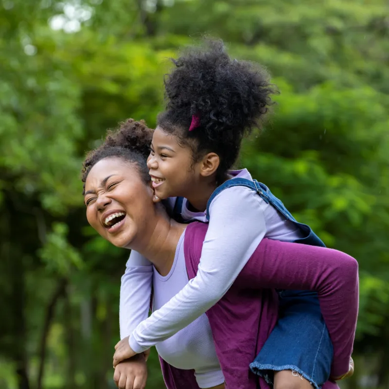 Mother and daughter enjoying the park together