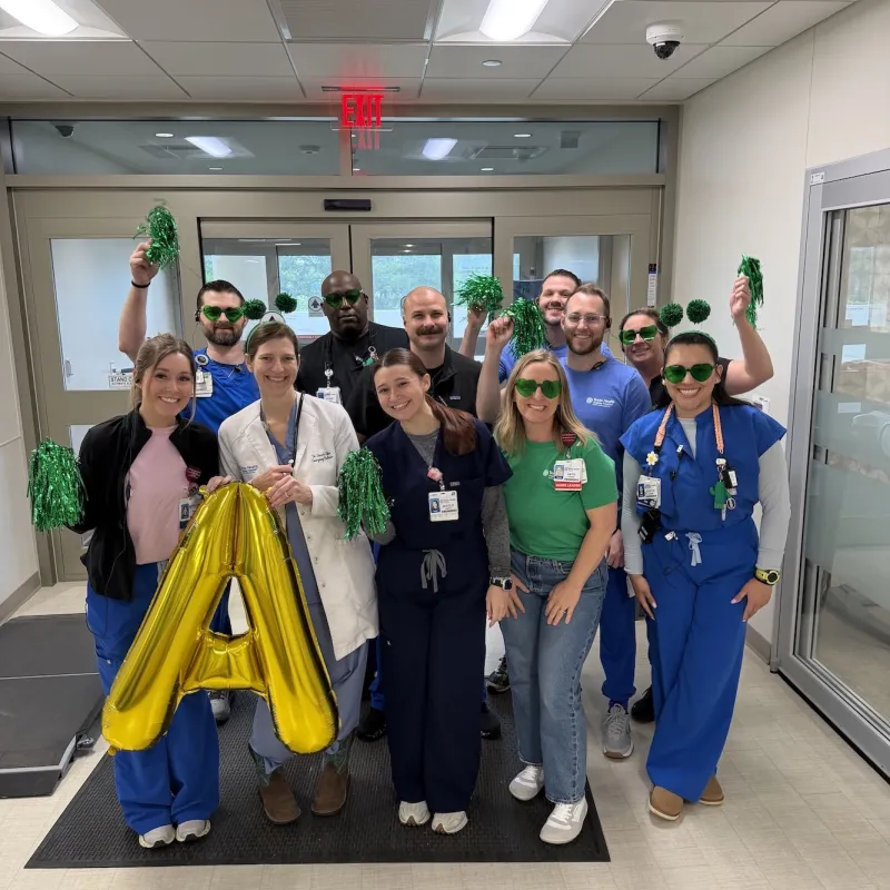 Texas Health Huguley team members celebrating their "A" grade on Leapfrog