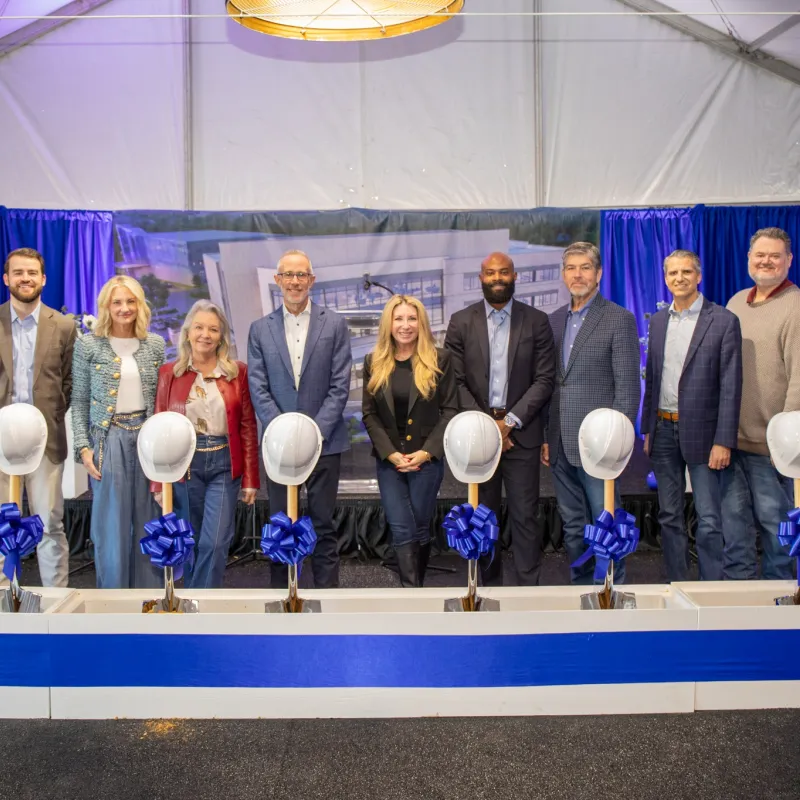 Texas Health Huguley executives standing in front of shovels for the groundbreaking event