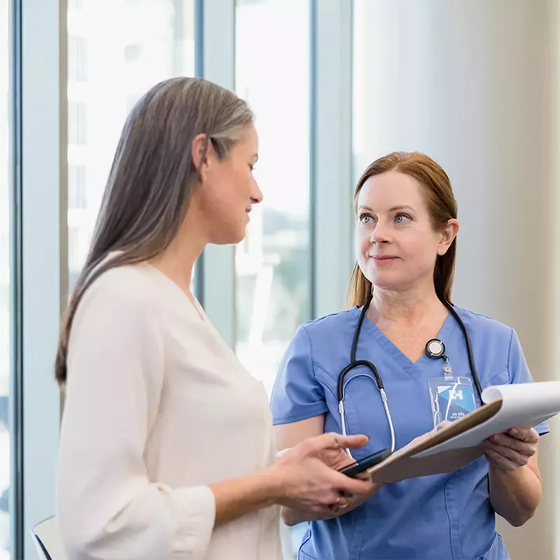 Woman Patient Talking To Provider