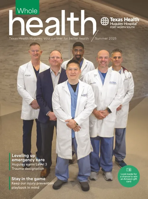 6 male providers, standing together in the hospital lobby