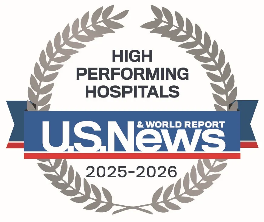 Emblem that represents high performing in several categories by US News & World Report
