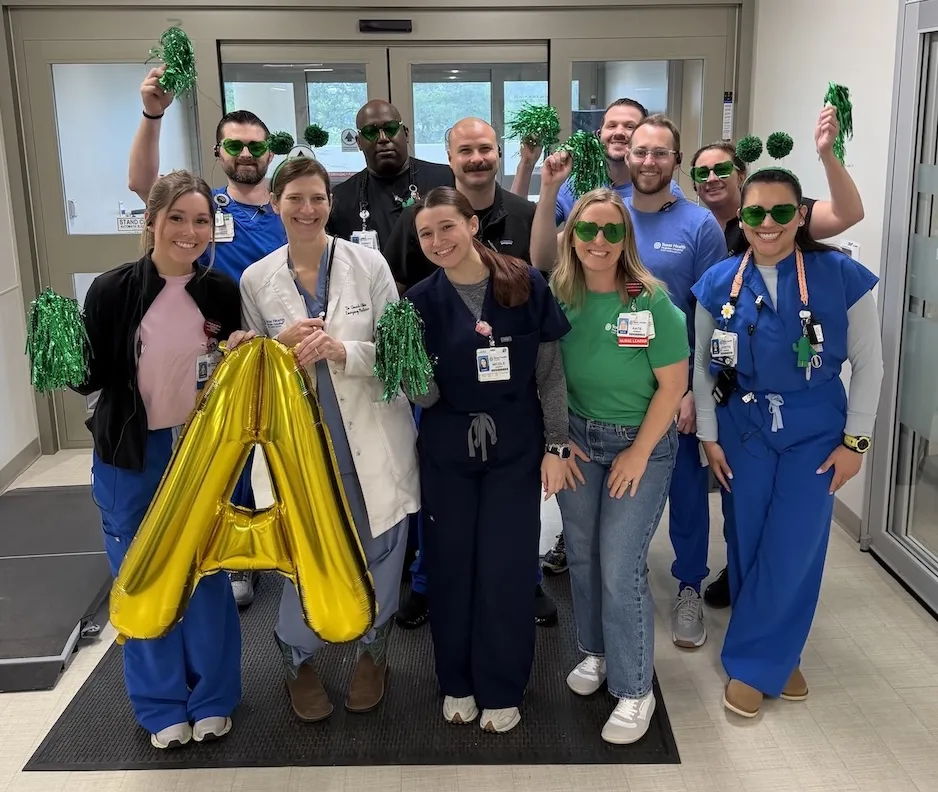 Texas Health Huguley team members celebrating their "A" grade on Leapfrog