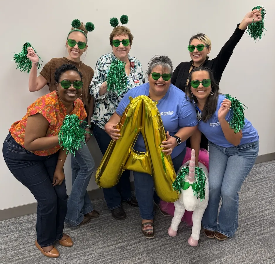 Texas Health Huguley team members celebrating their "A" grade on Leapfrog